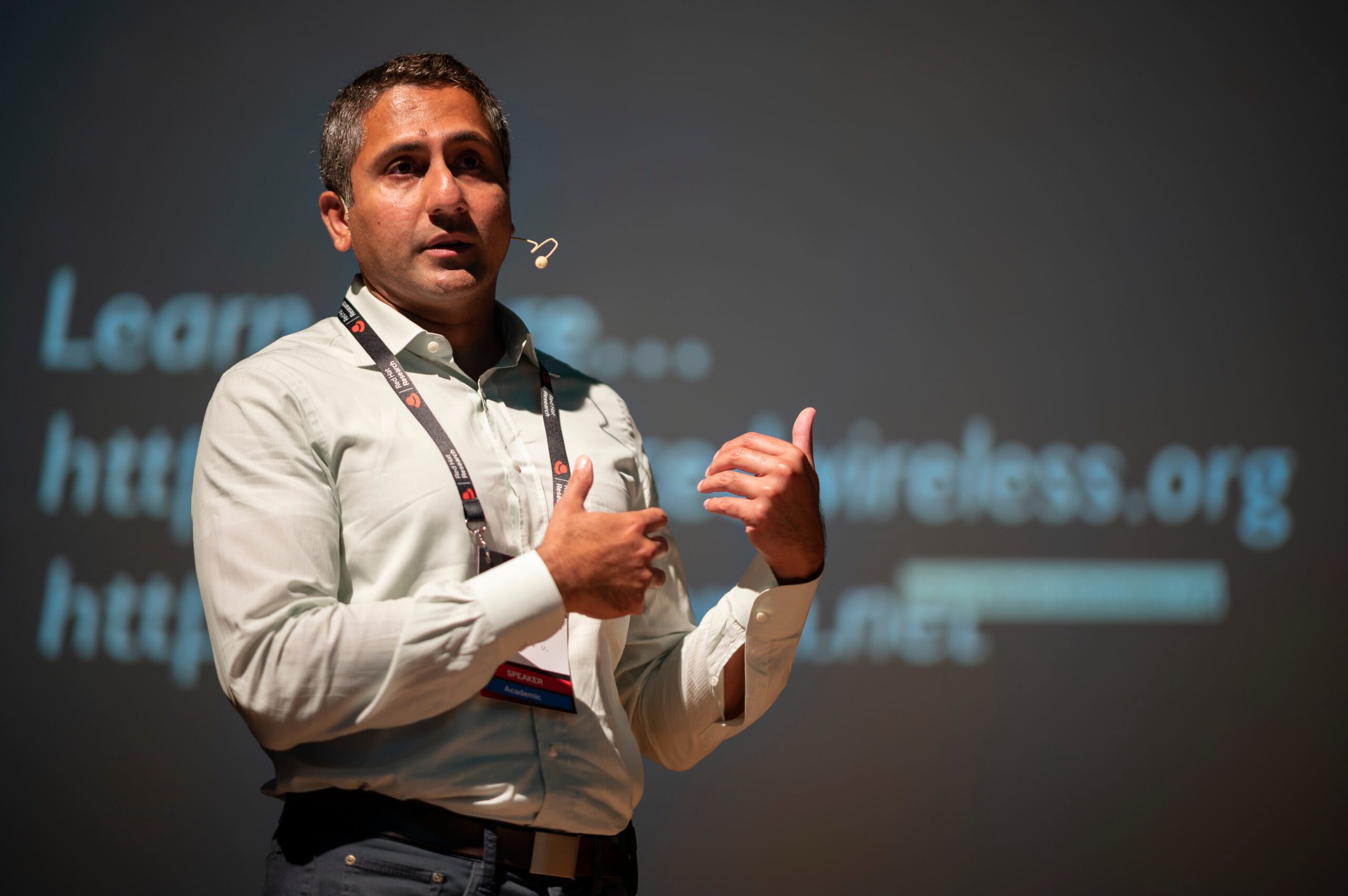 Manu Gosain presenting at Red Hat Research Day Europe in Brno, September 2022